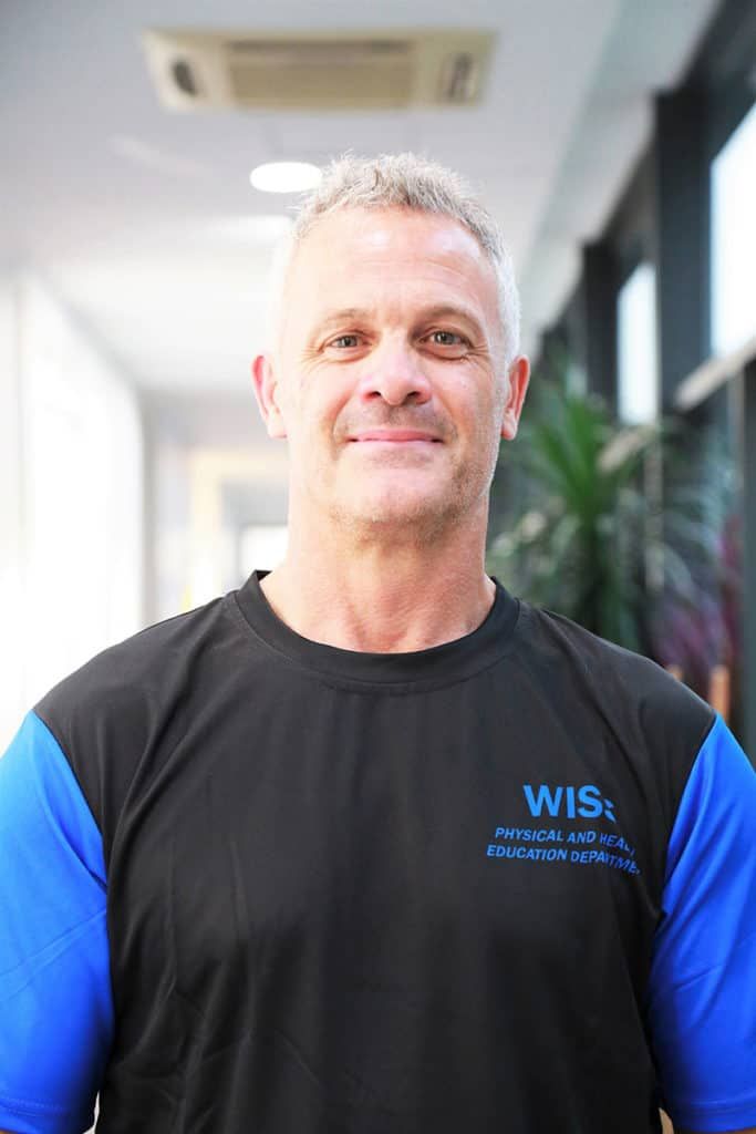 The Director of PHE and Athletics at WISS, Tony Anderson