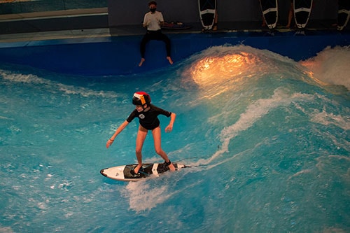 Students practice water sports during physical education