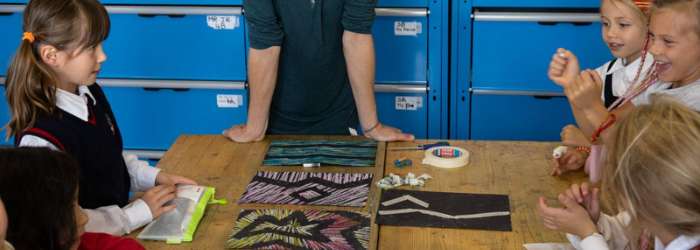 Latest news from TASIS - October, 2022 12 Children engaging in craft activities at a World Schools classroom.