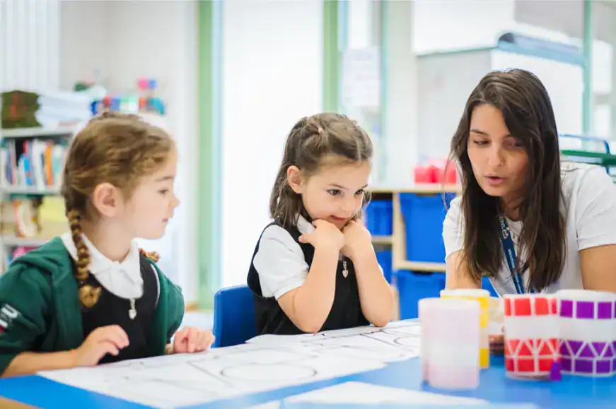 Young students learning in a bilingual classroom at Haut-Lac International School.