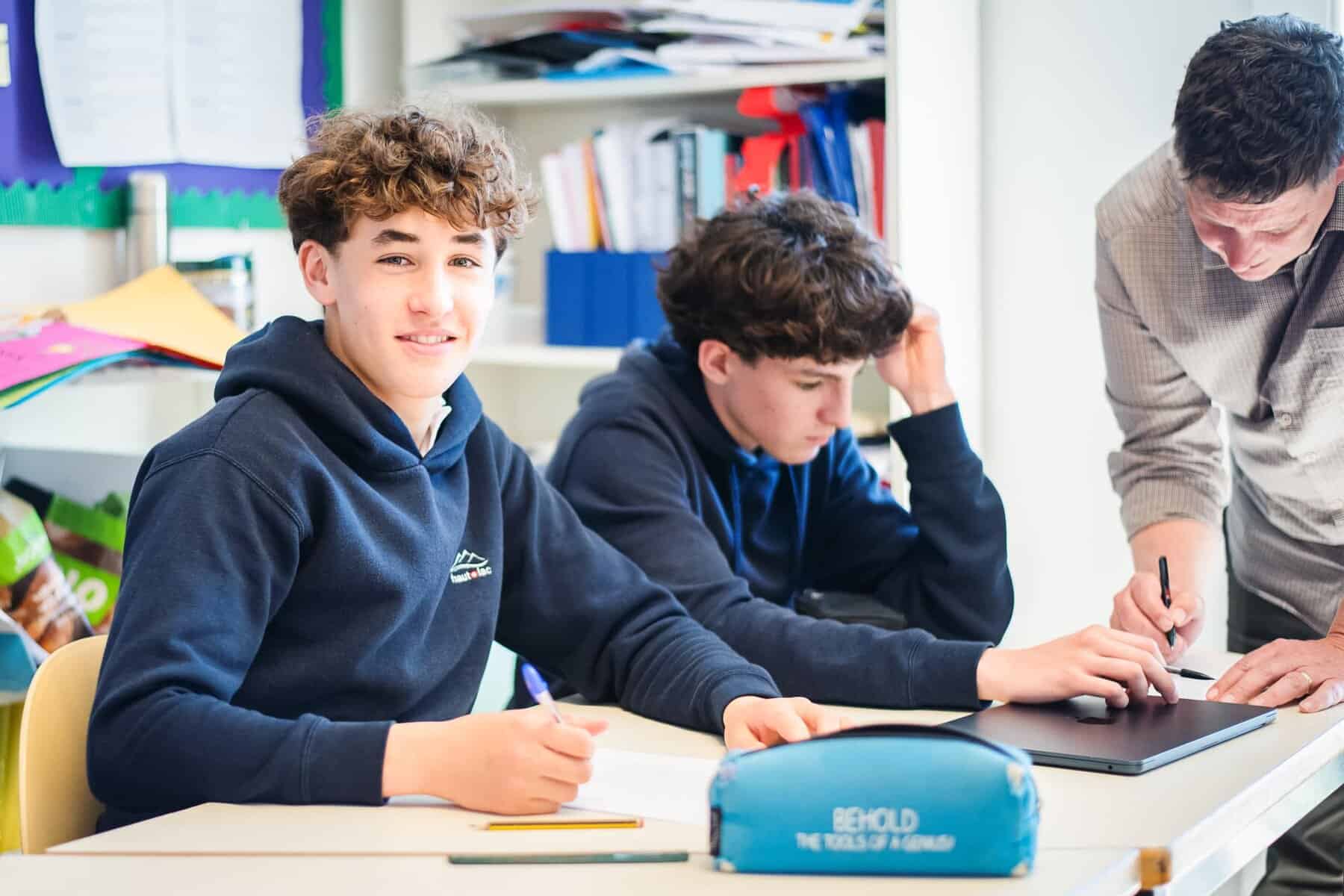 Young students engaged in classroom learning at Haut-Lac International Bilingual School.