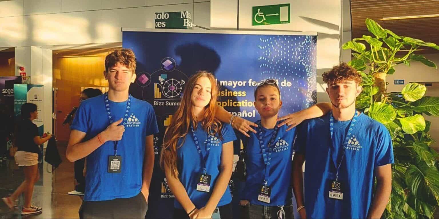 Diverse Studierende auf einer internationalen Wirtschaftskonferenz, die globale Bildung und Führungsqualitäten in einem professionellen Umfeld fördert.