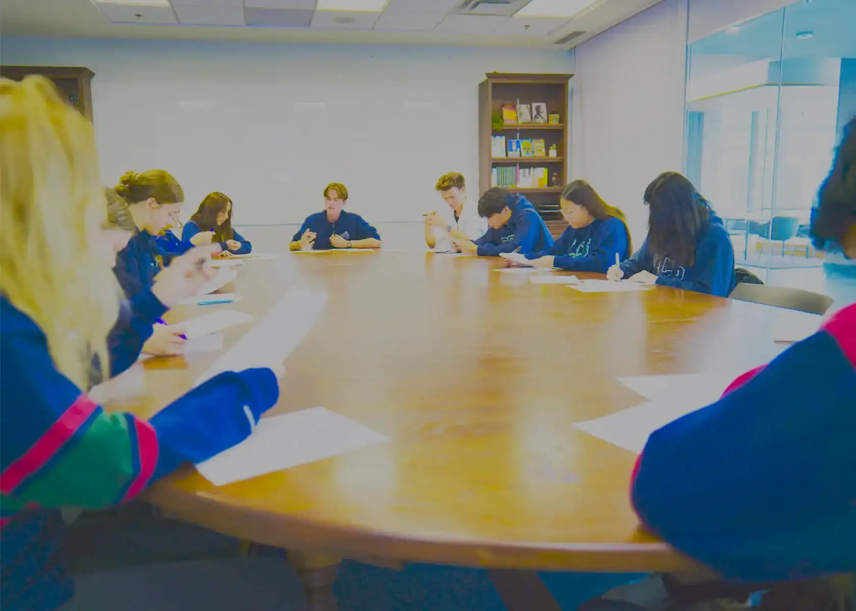 Modern classroom with students engaged in discussion at Lakefield College School.
