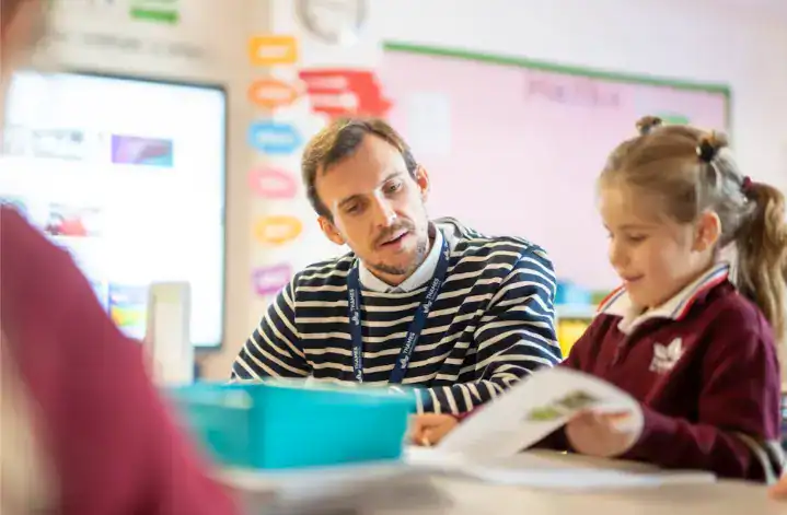 Teacher and student engaged in learning at Thames British School Madrid.