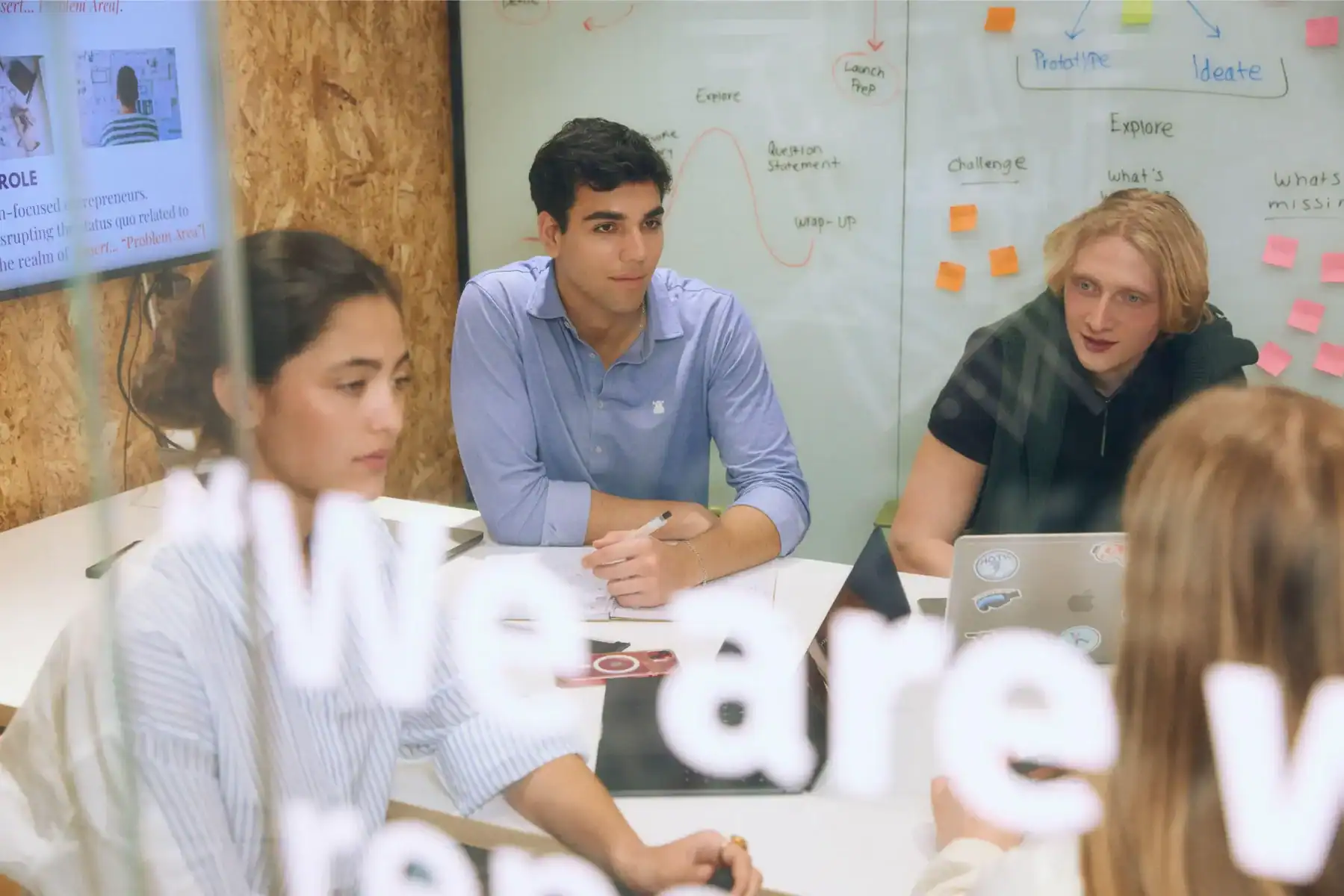 Diverse students engaged in a collaborative learning session at The Global College.