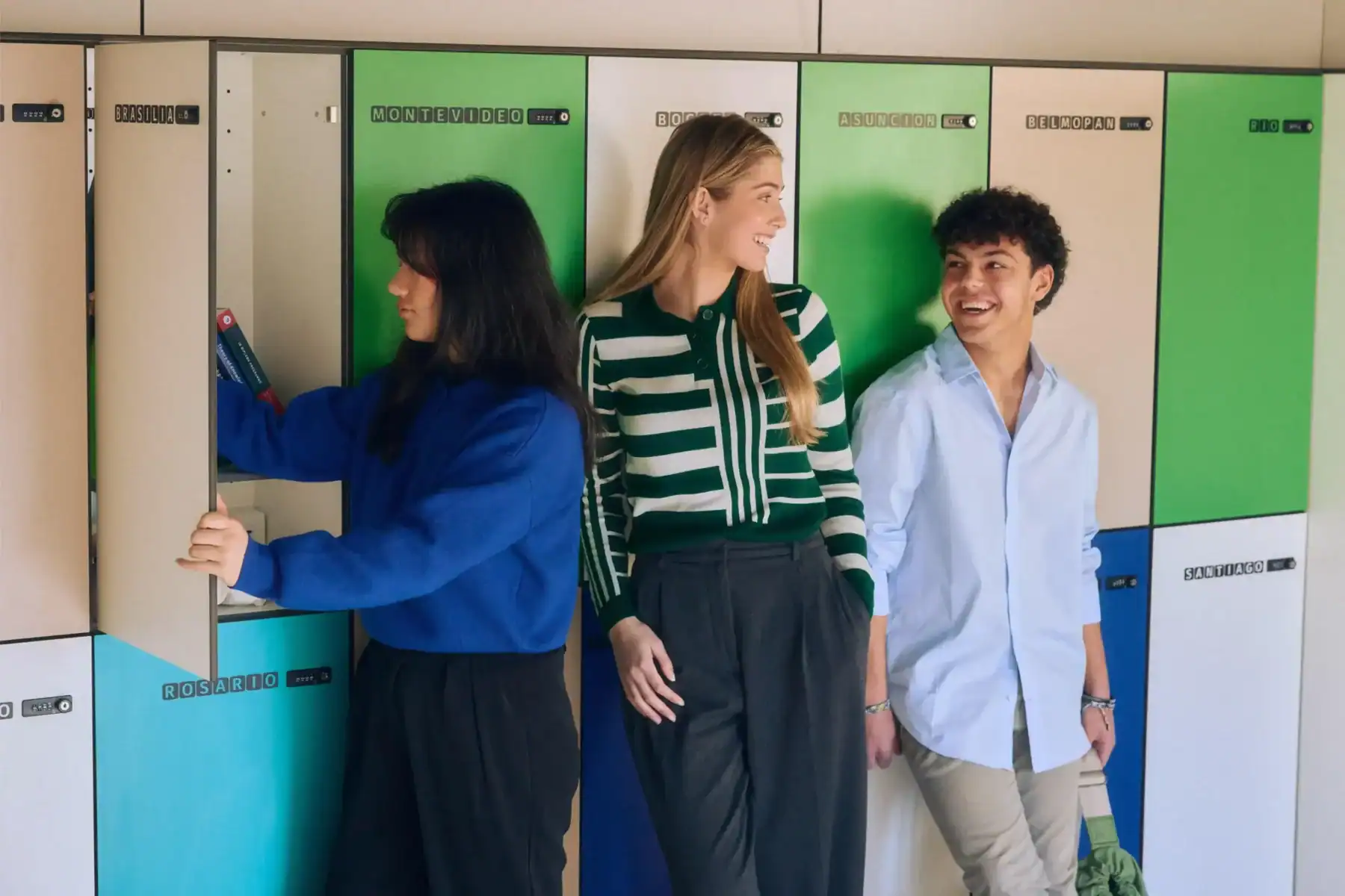 Students interacting and preparing for classes at The Global College lockers.