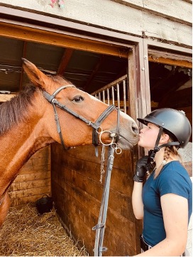 astrid kissing her horse