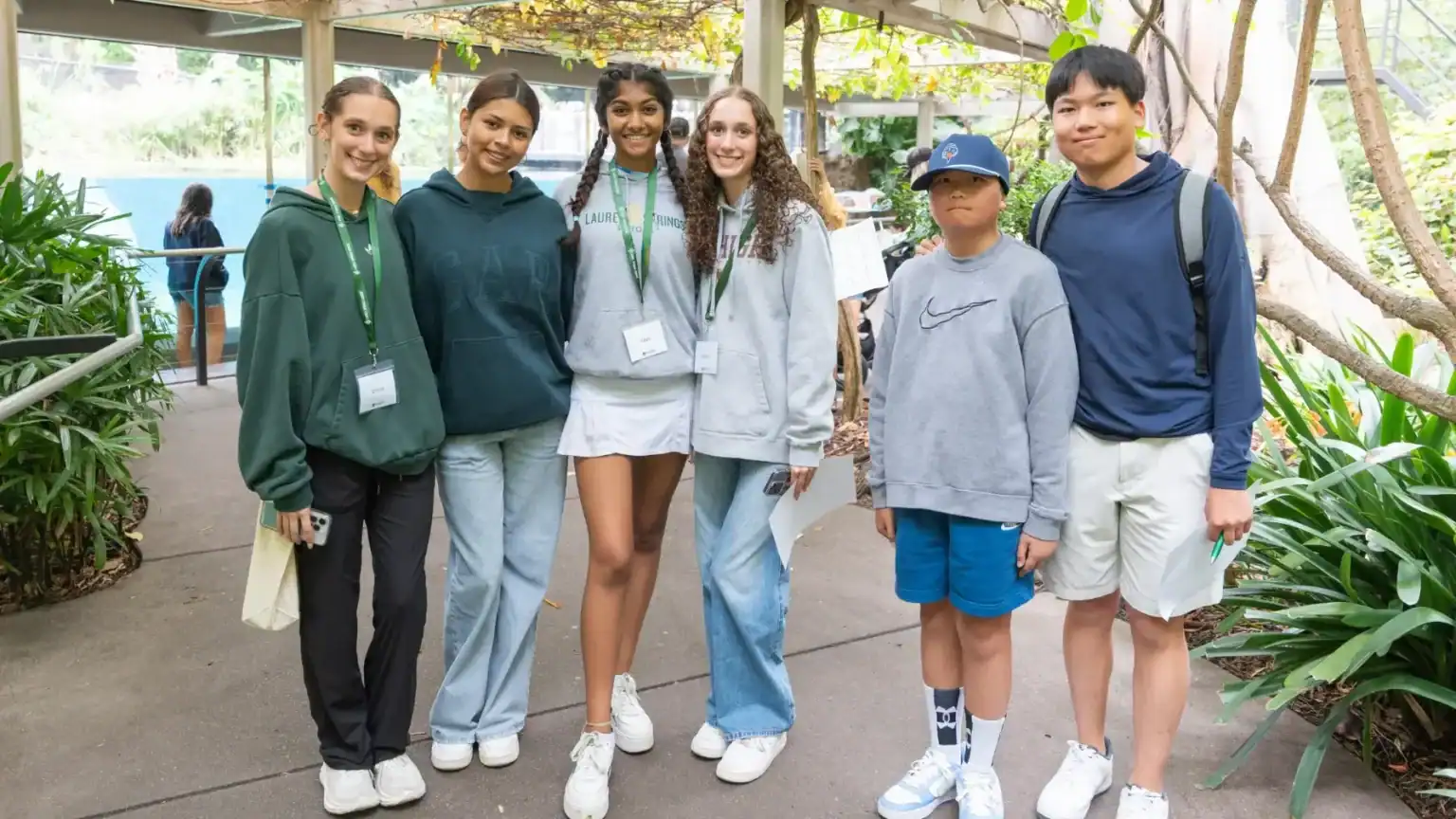 Group of diverse students at Laurel Springs School campus outdoors.