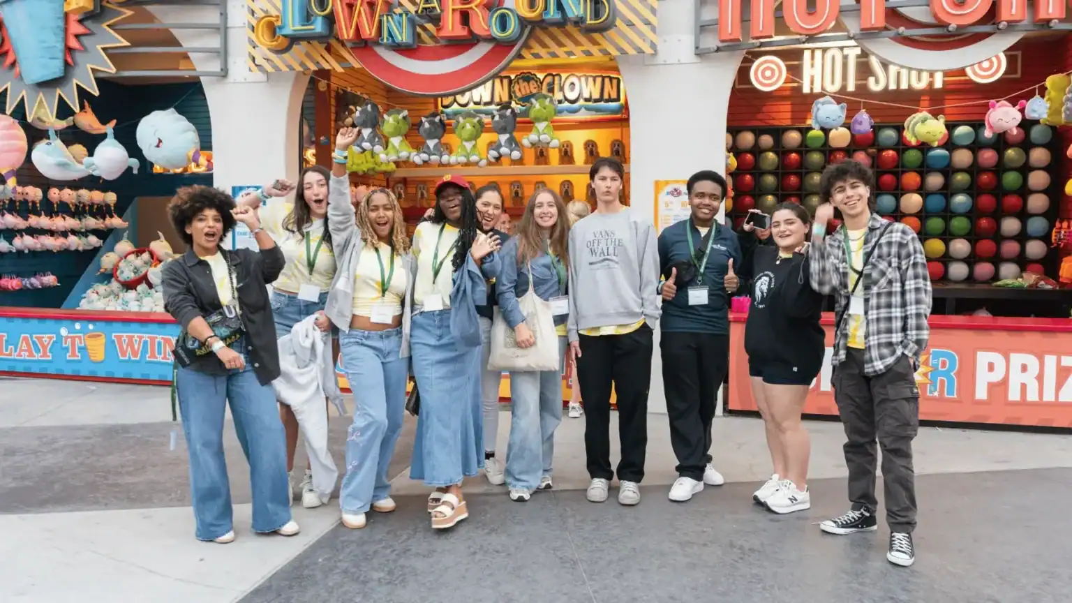 Group of diverse students enjoying a day at the amusement park.