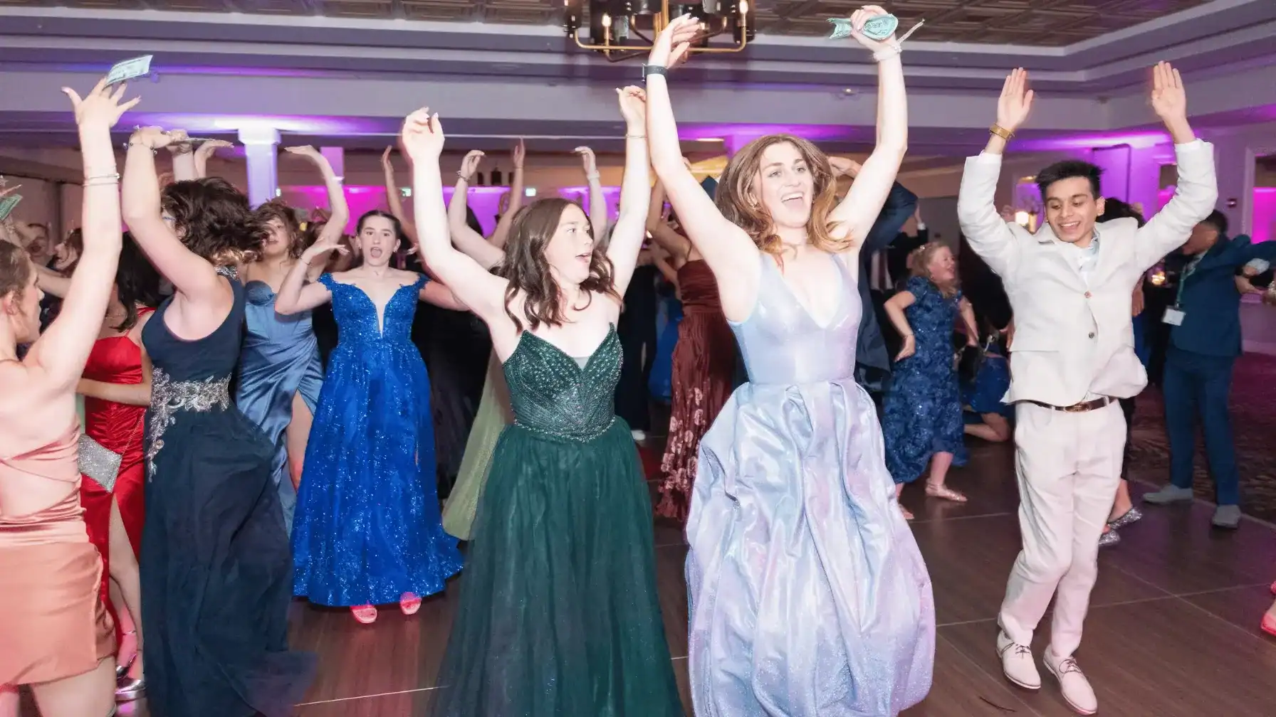 Students dancing at Laurel Springs School event, celebrating success.