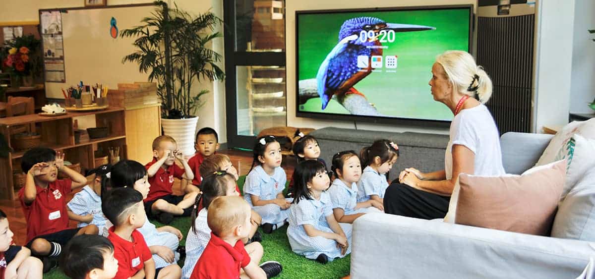 Children engaging in interactive learning at Dulwich College Shanghai Pudong.