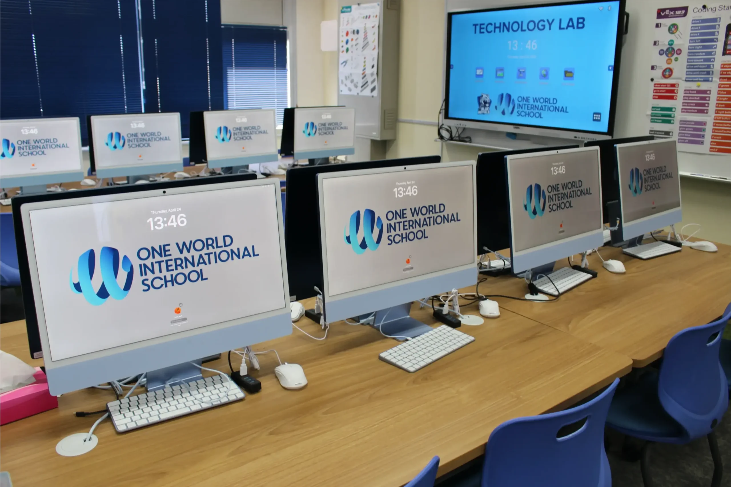 Advanced computer technology lab at World Schools, equipped with modern iMacs for innovative international education.