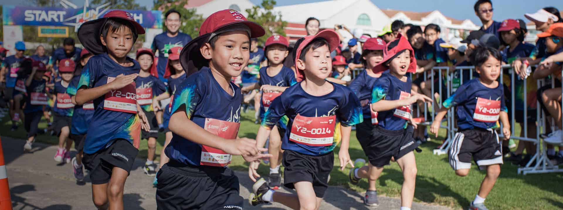 Children participating in a school sports event at a World Schools competition.