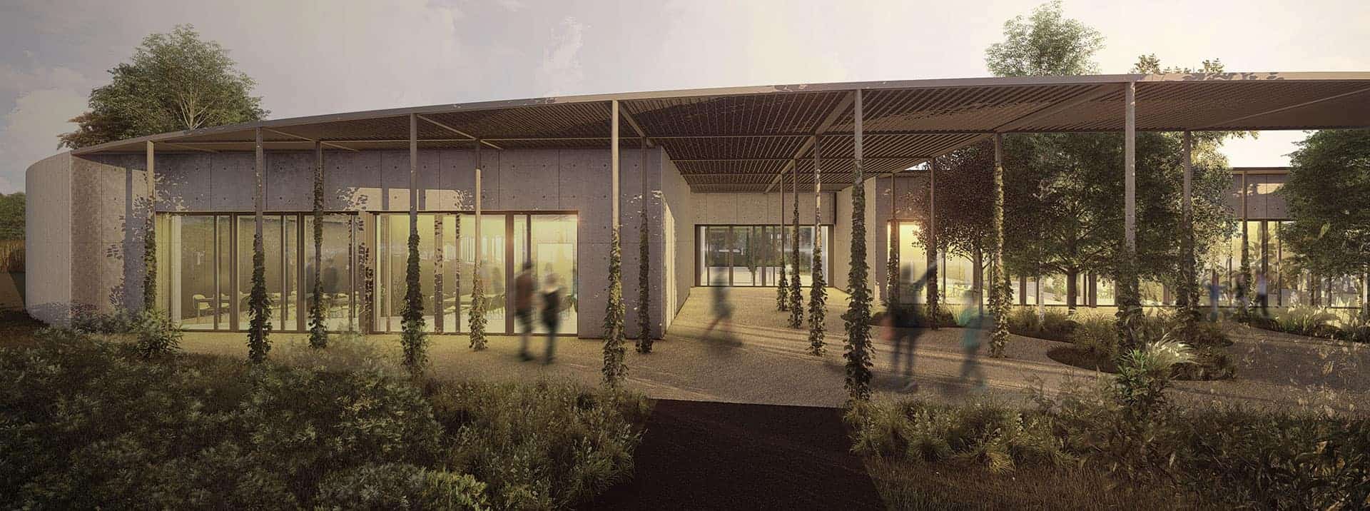 Modern school building with eco-friendly architecture and lush landscaping for international students.