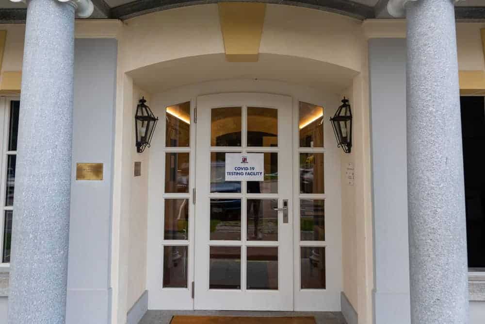 This Month at TASIS: September 2020 3 COVID-19 testing facility at a prestigious school entrance for health safety.