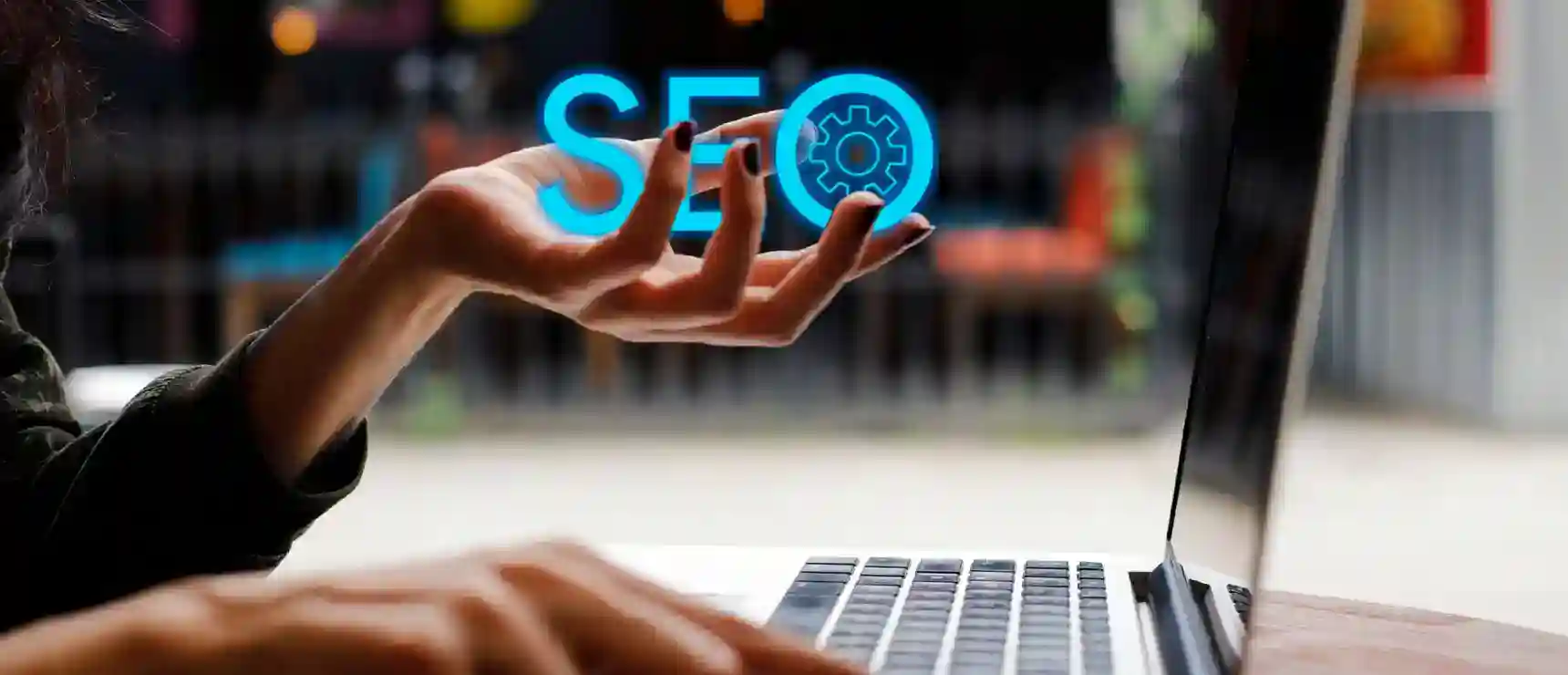 Innovative SEO strategies concept with digital gear icon on "SEO" text at the computer, emphasizing online marketing and search engine optimization.