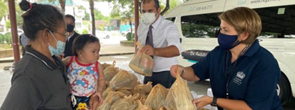 Affordable global school food aid distribution for students' well-being and community support.