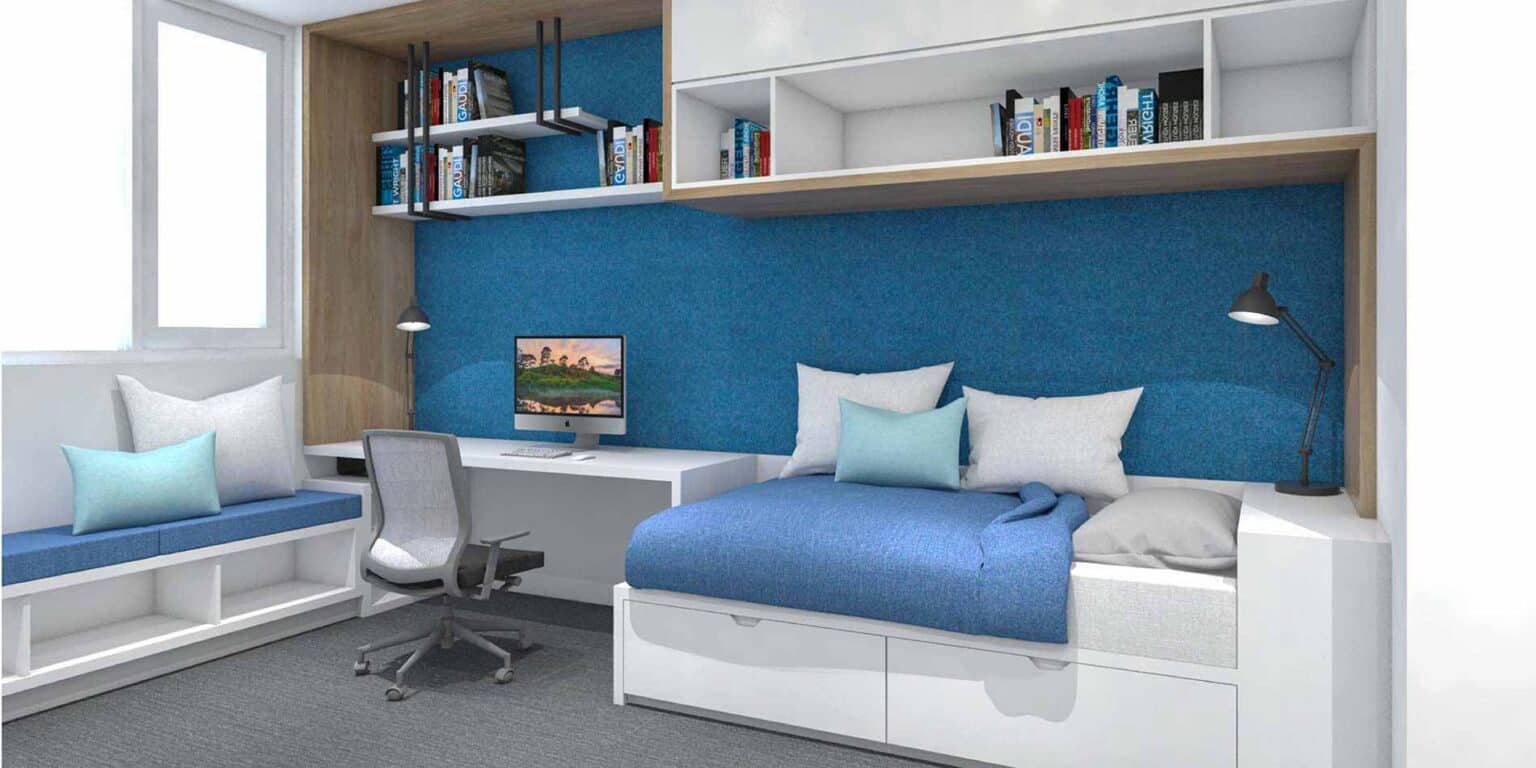 Modern student dorm room with study area, blue accents, and built-in storage for convenient learning at top world schools.