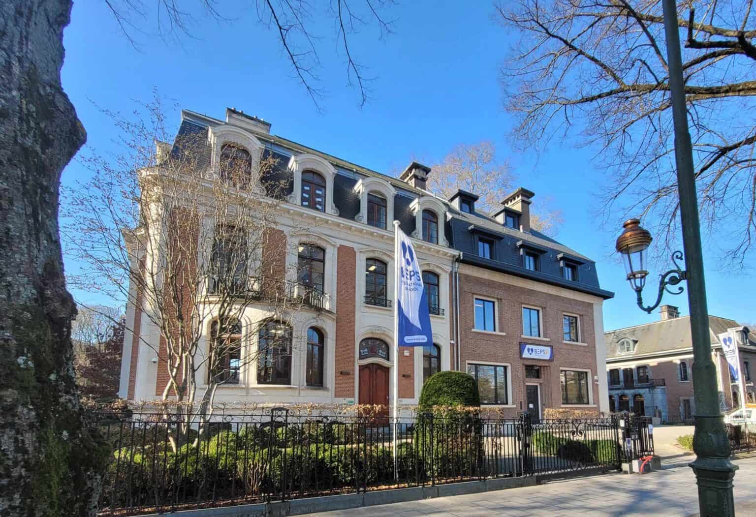 Modern European-style building housing World Schools international school campus.