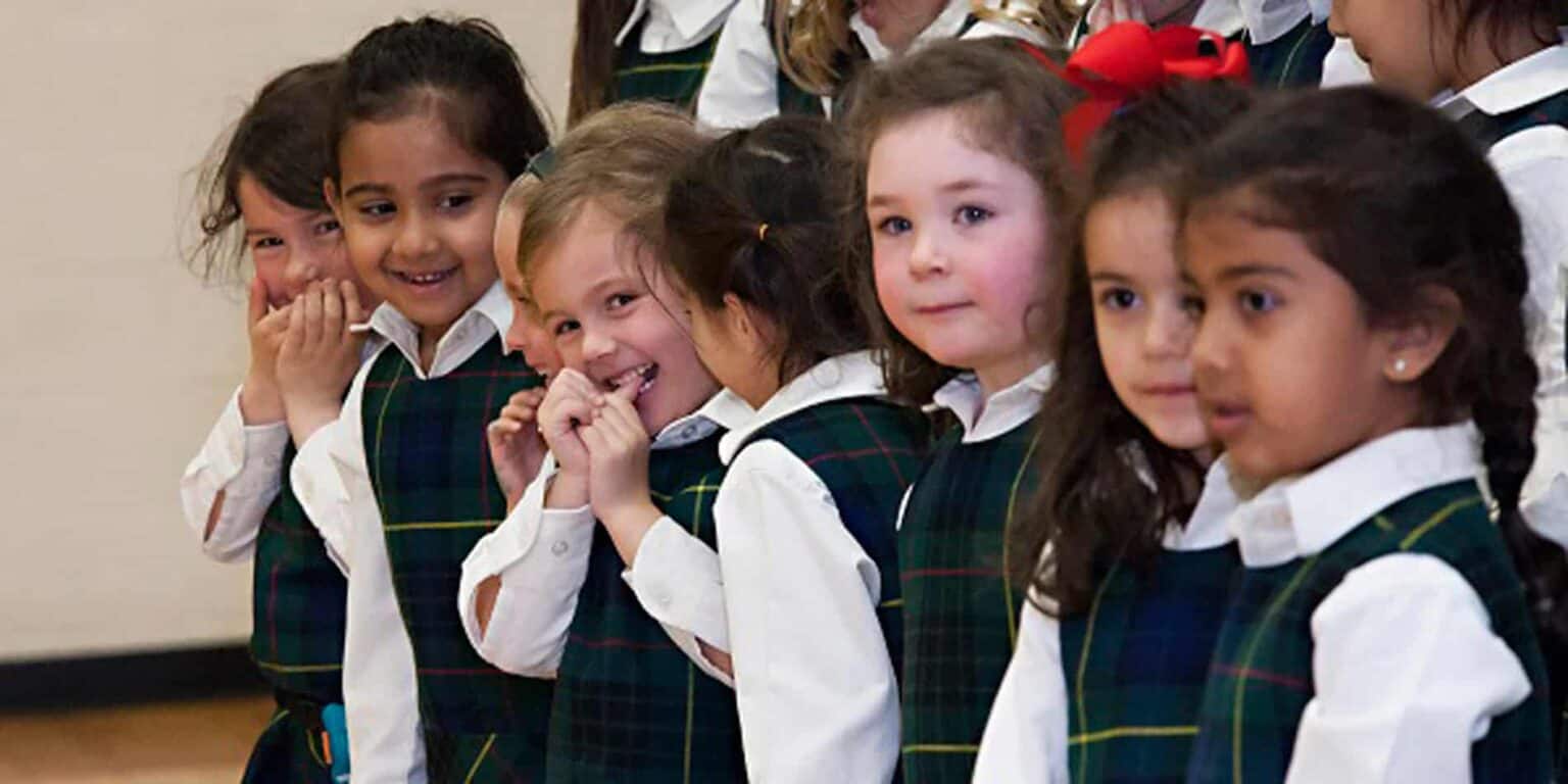 Bright, happy children at World Schools event showcasing diverse student community and engaging learning environment.