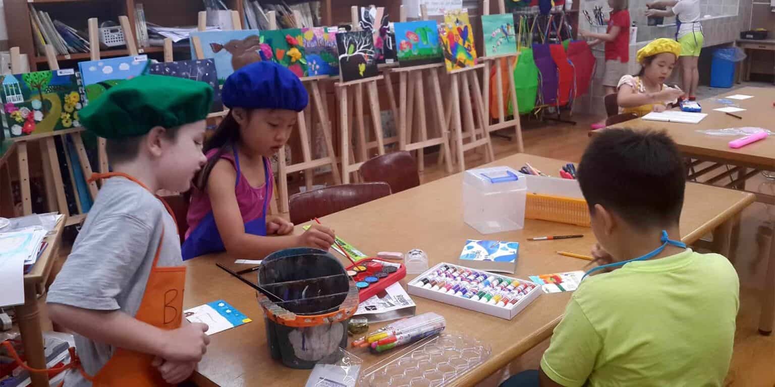 Colorful children's art activity in a school classroom for creative learning and development.