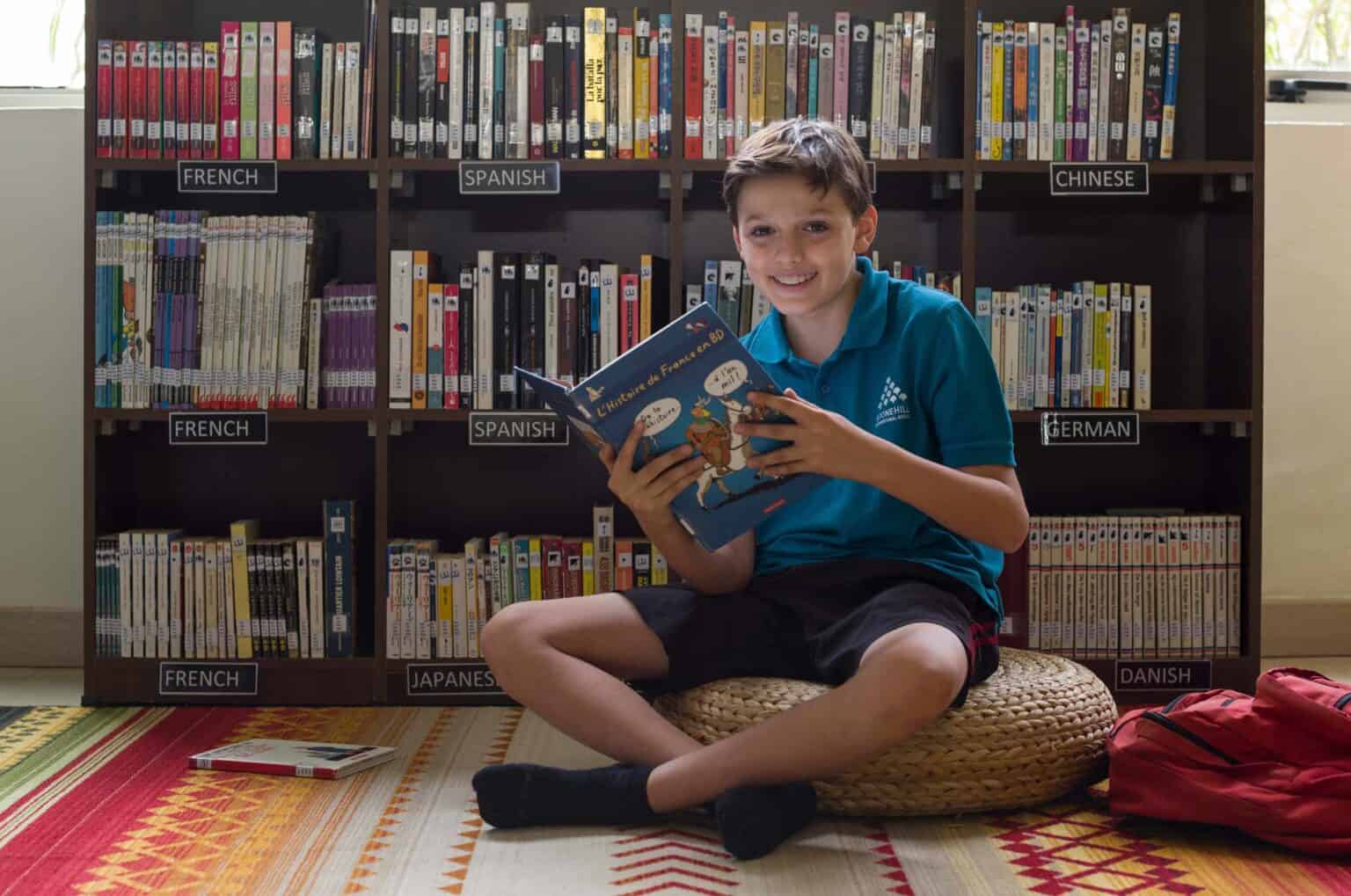 Children exploring language learning at a multicultural school library.