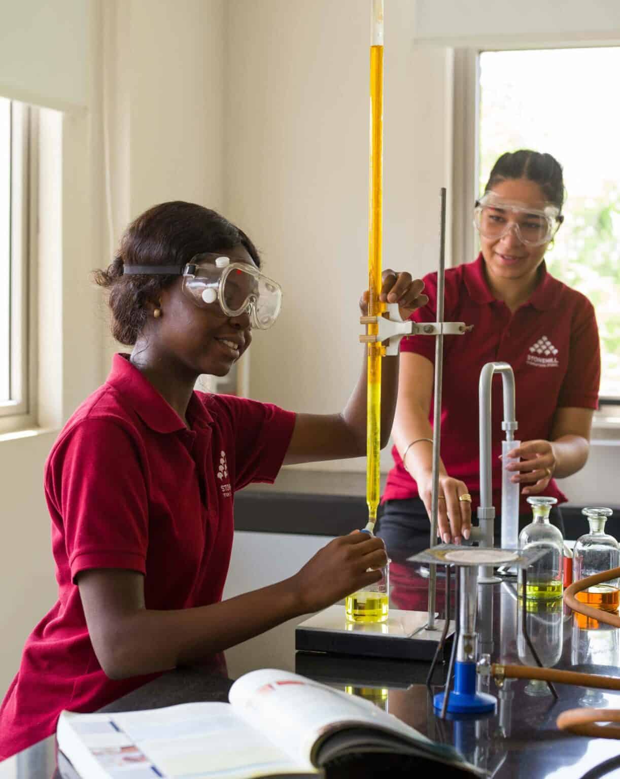 Innovative school science students conducting experiments in a modern classroom.