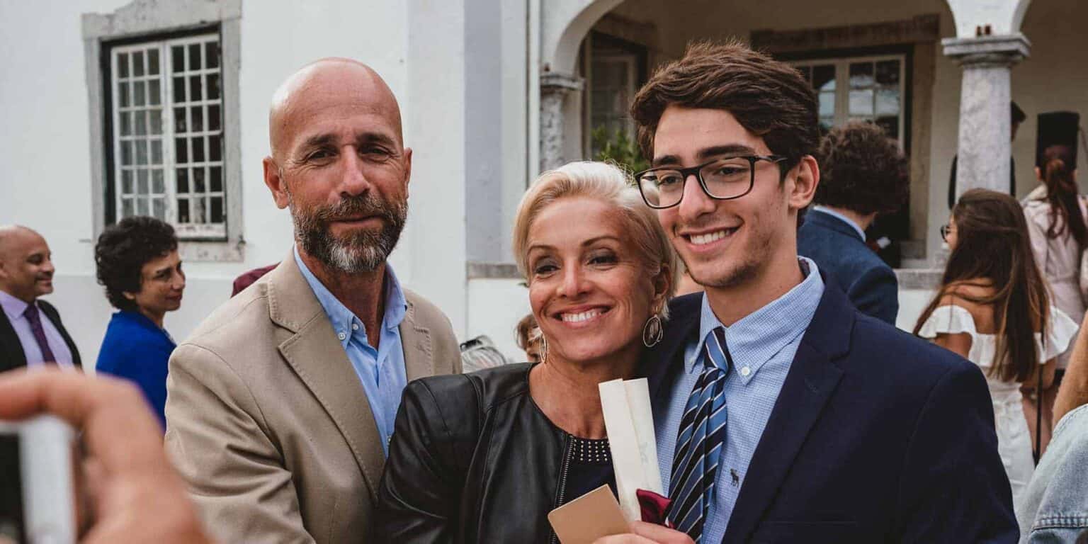 Inspiring image of students and parents celebrating graduation to showcase excellence in world schools for optima.