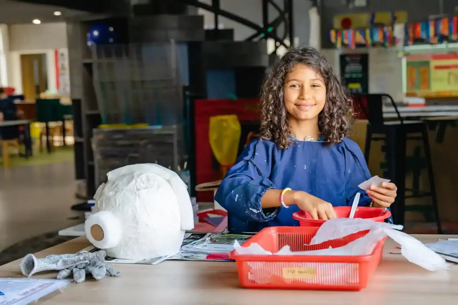 Colorful Upcycling Art Project at International School, Promoting Creativity and Sustainability.