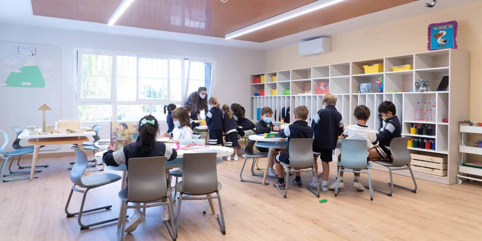 Children engaging in classroom activities at a top international school.