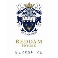 Highly prestigious international school crest with a lion emblem and royal crown.