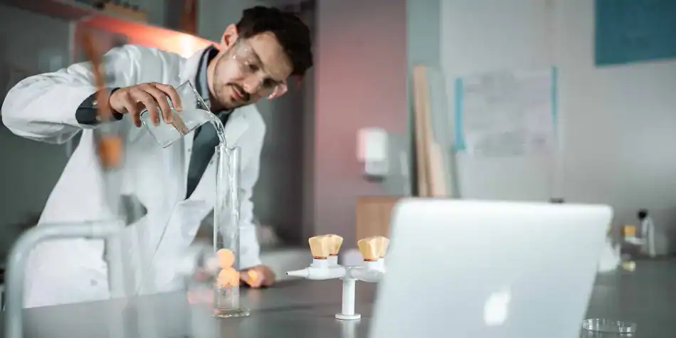 1. Modern science classroom with student conducting chemistry experiment with laboratory glassware.
