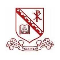 A shield with Latin inscriptions and symbols representing academic excellence and values.