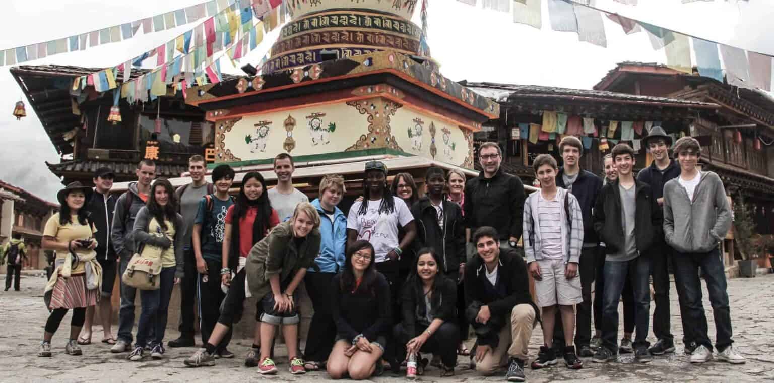 Students group photo at World Schools cultural site, promoting global education and international learning experiences.