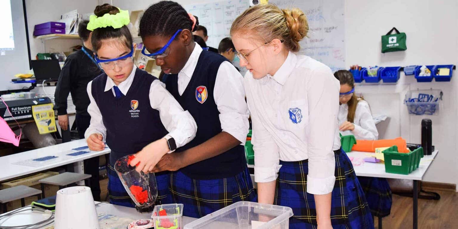 Innovative world schools science lab with diverse students engaging in hands-on experiments for enhanced STEM learning.