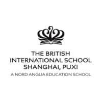 Brightly lit logo of The British International School Shanghai Puxi, highlighting world-class international education.