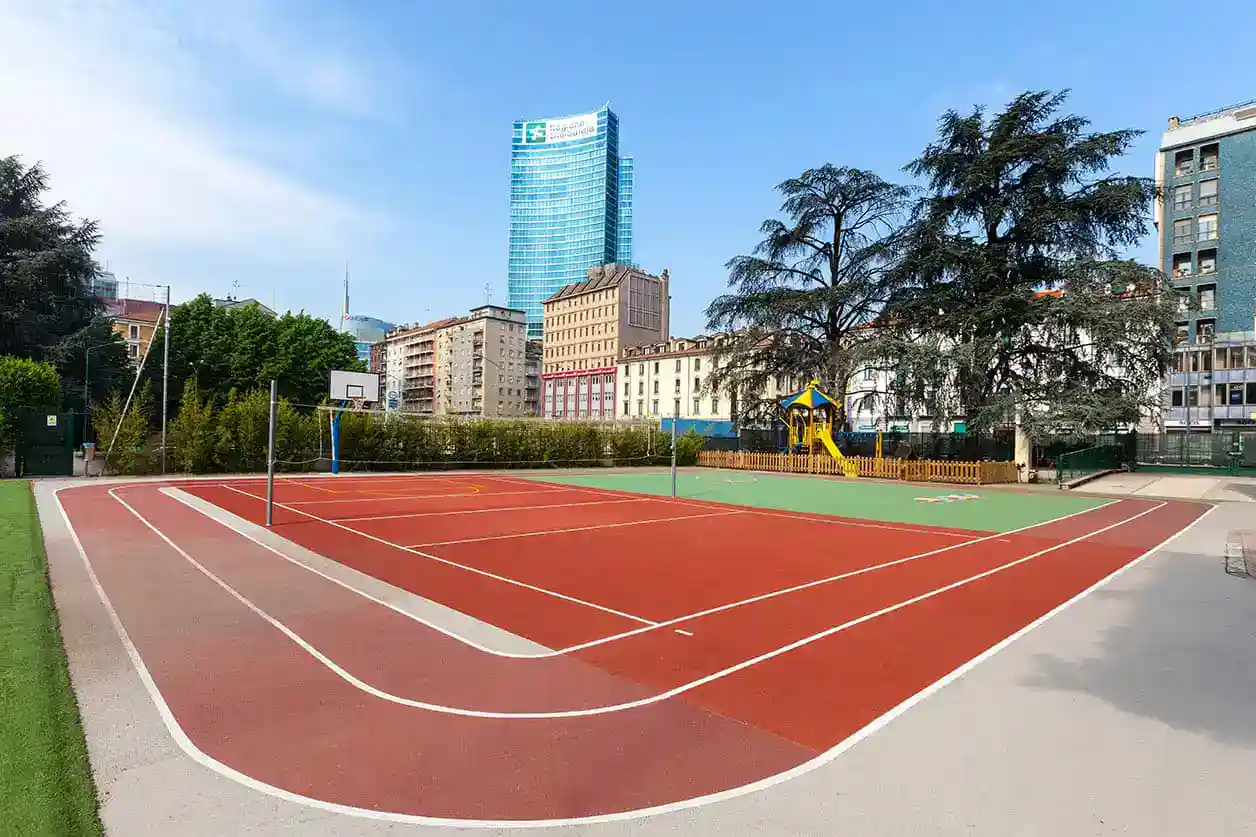 1. Modern outdoor sports court at a global school in an urban setting.