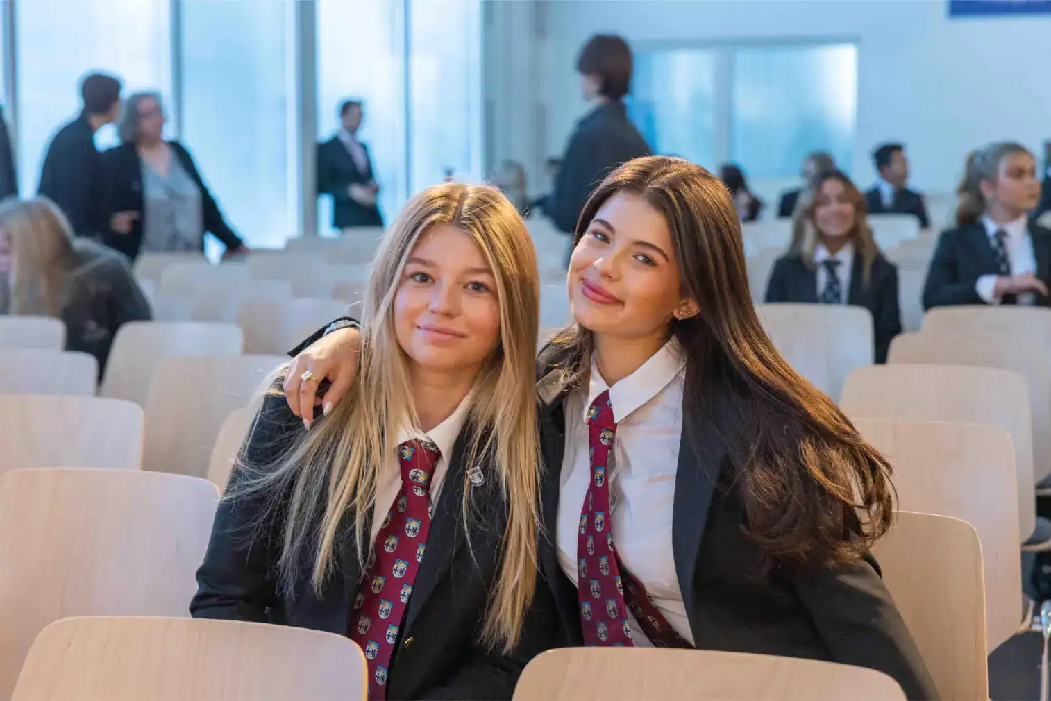 Modern students attending an international school event, promoting global education and academic excellence.