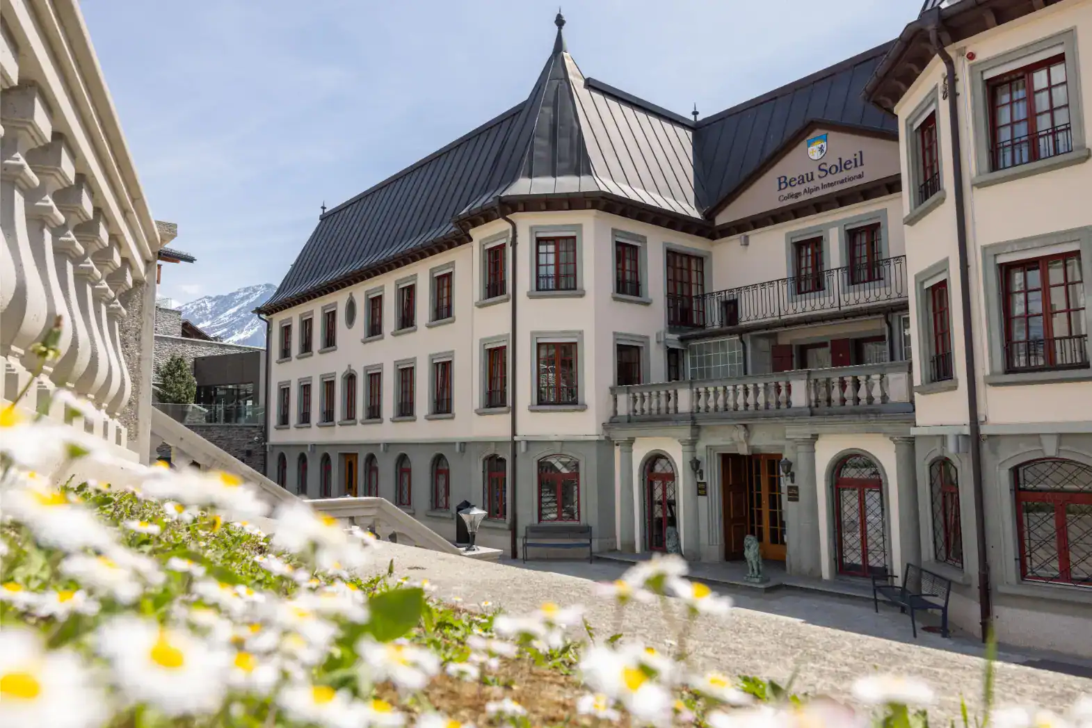Elegant European-style school building at Beau Soleil College Alpin International in the Alps.