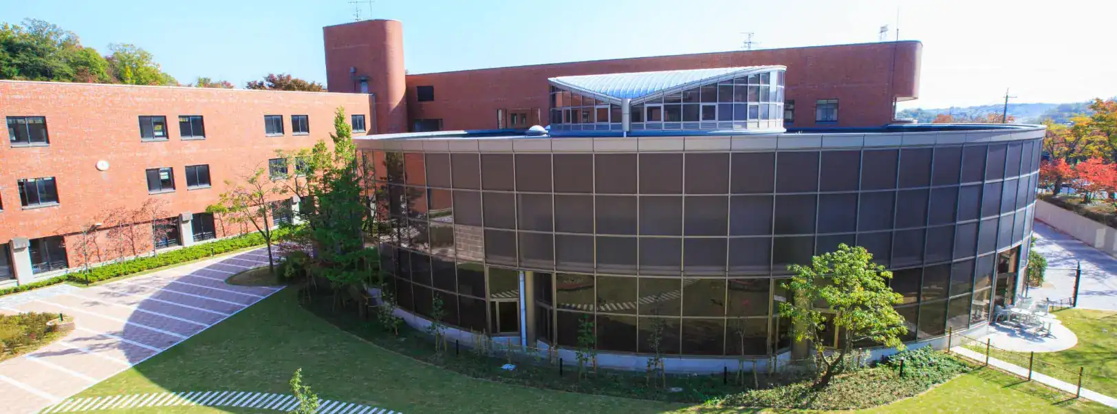 Modern school building with glass exterior at World Schools campus.