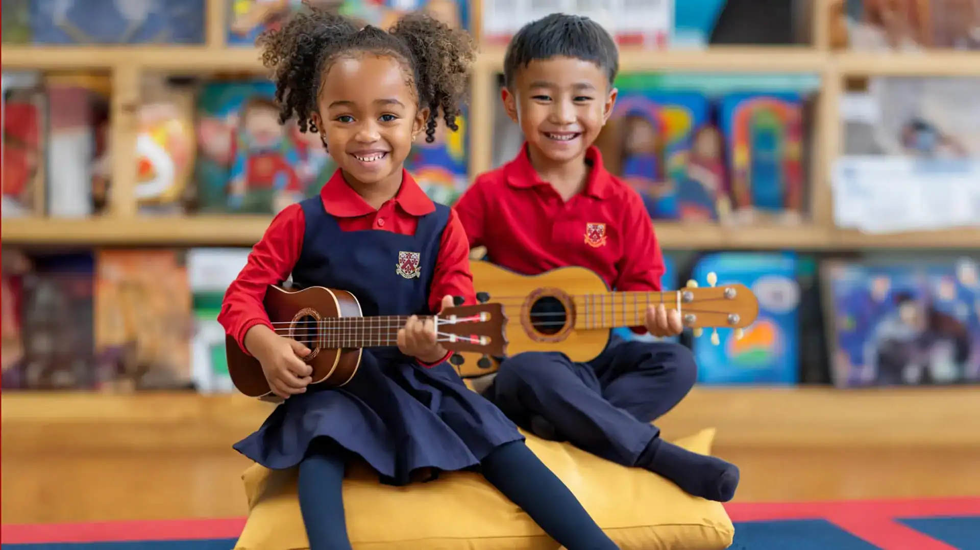 Cheerful multicultural children playing guitars in kindergarten classroom, fostering creativity and musical skills.