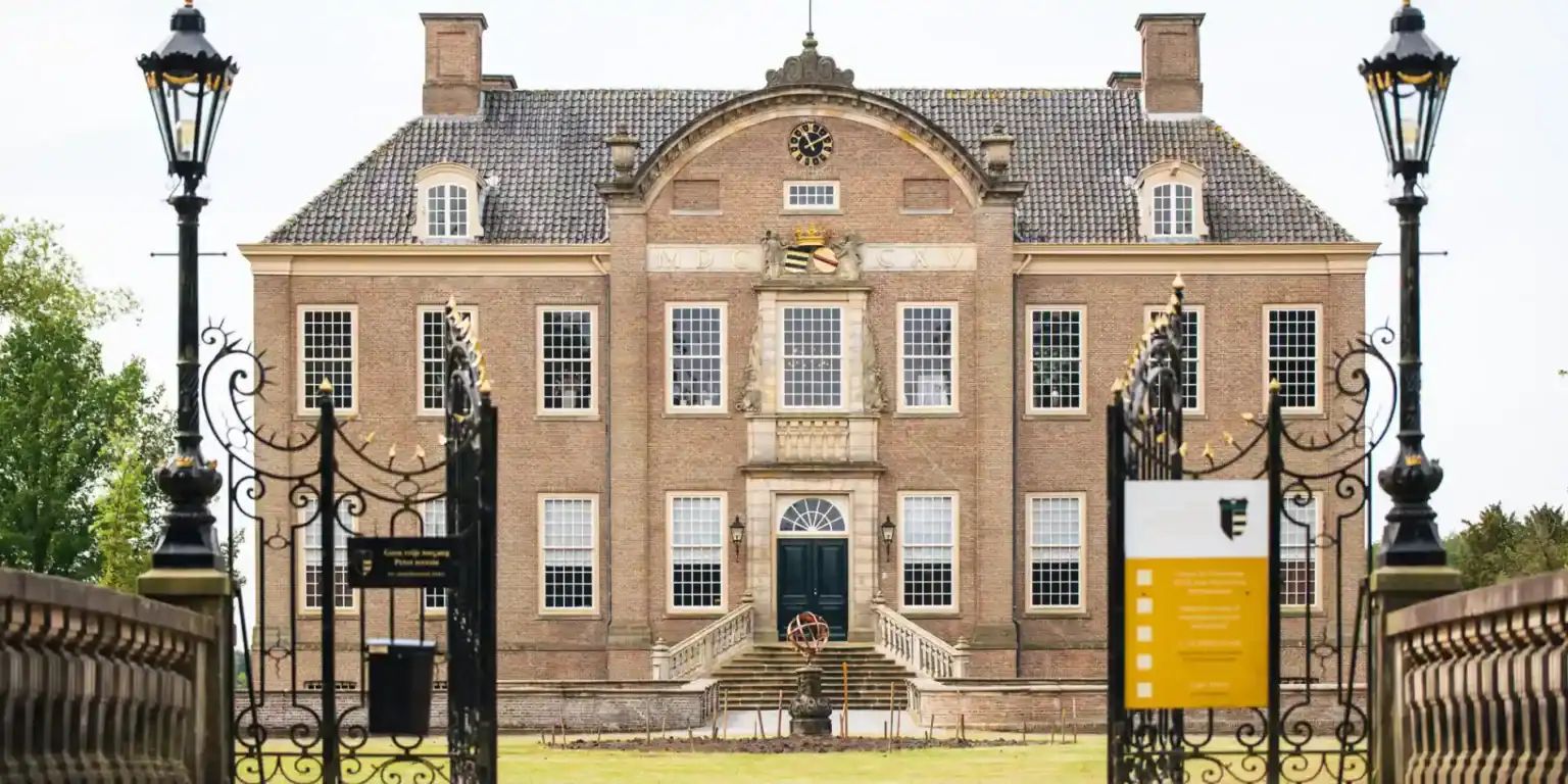 Beautiful historic school building with elegant entrance and traditional architecture.