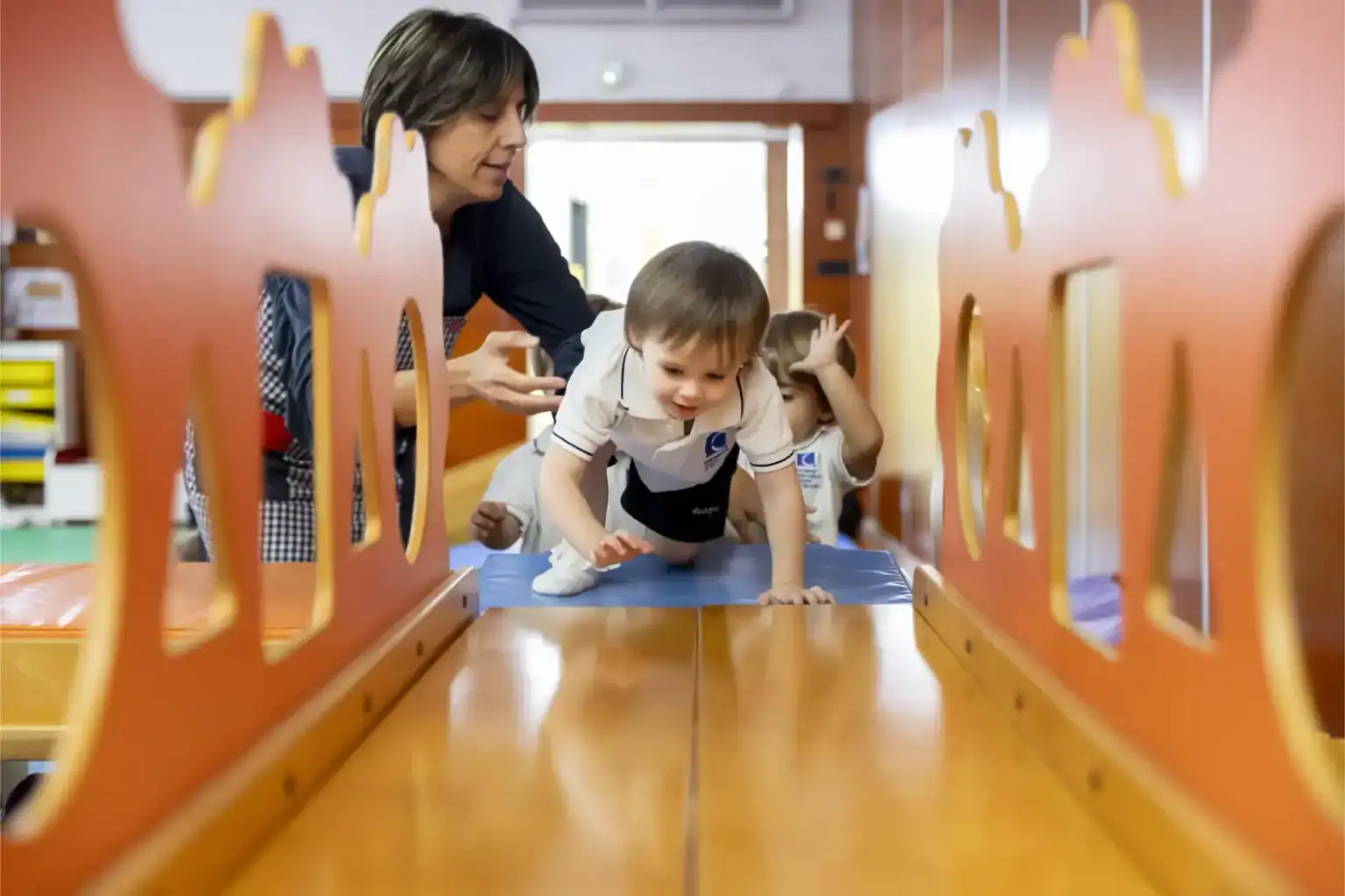 Young children engaging in preschool activities at a World Schools educational environment, fostering early learning and development.