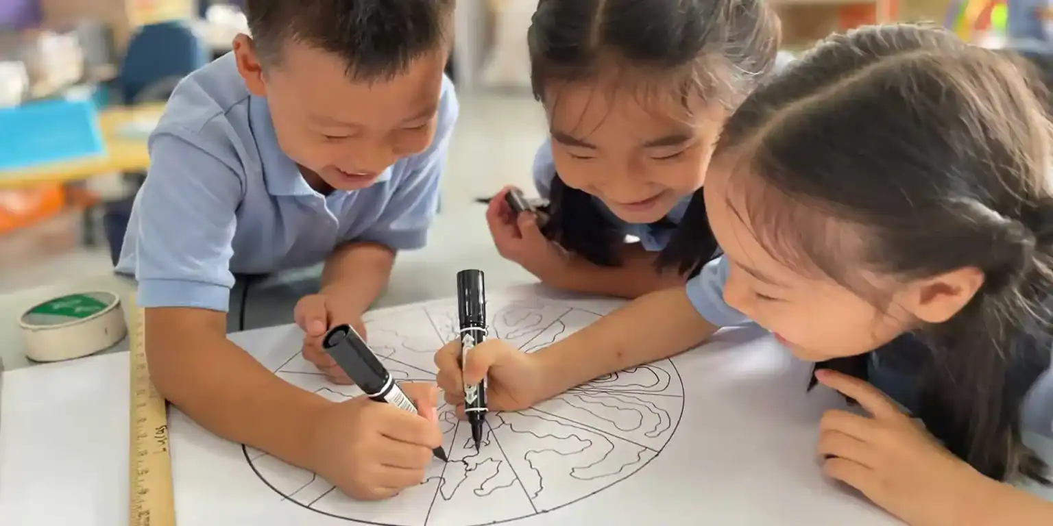 Young diverse students collaboratively drawing and coloring at school, fostering creativity and teamwork in an engaging learning environment.