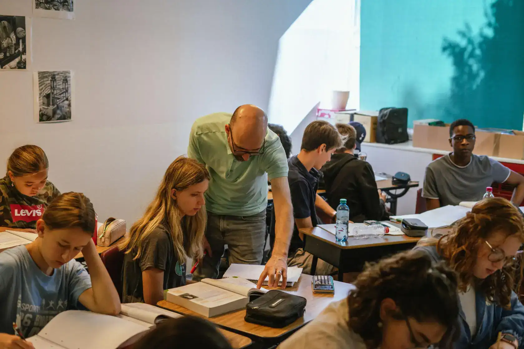 Engaging classroom scene at World Schools with diverse students and instructor for international education.