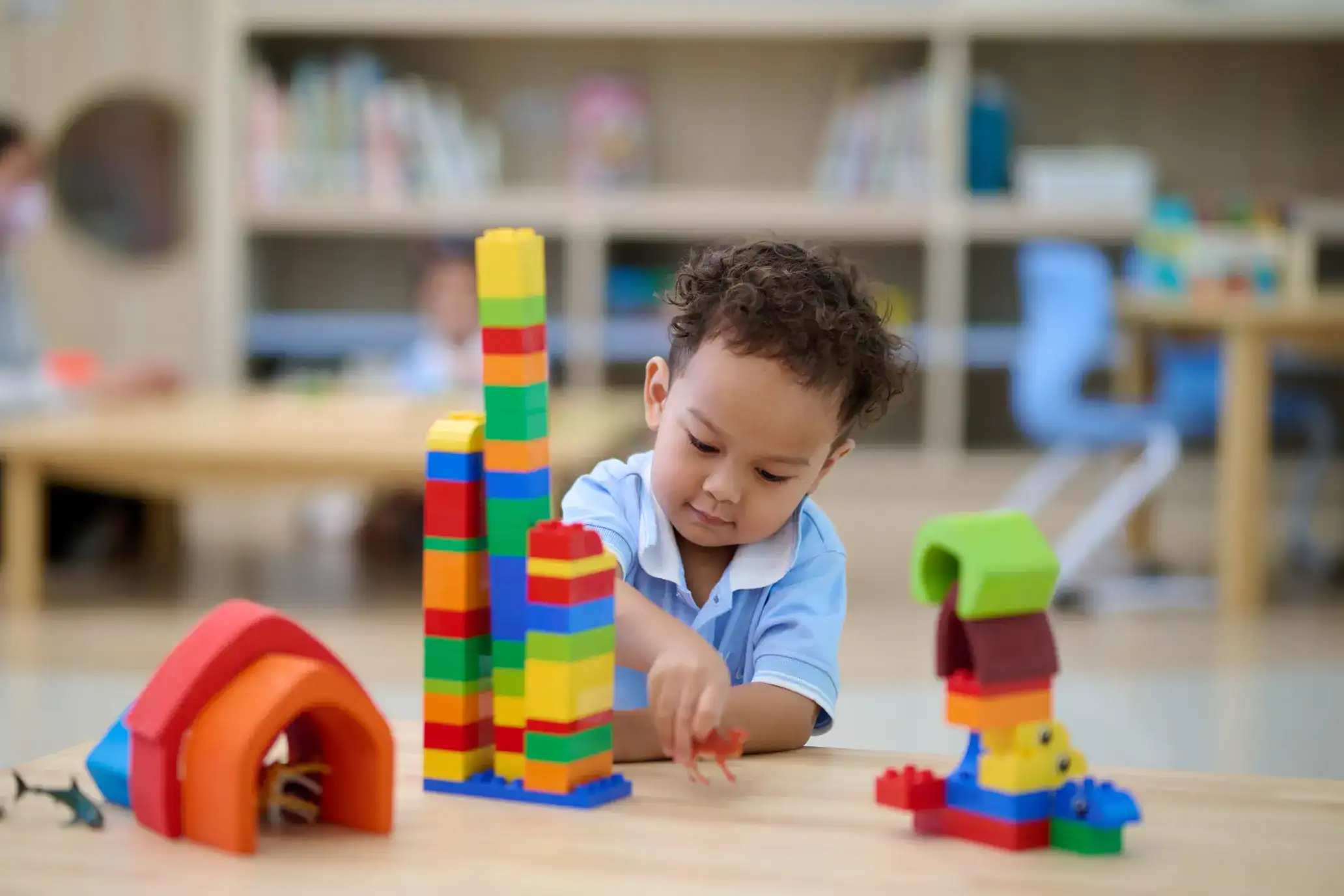 Colorful LEGO blocks building for early childhood education at a World Schools setting.