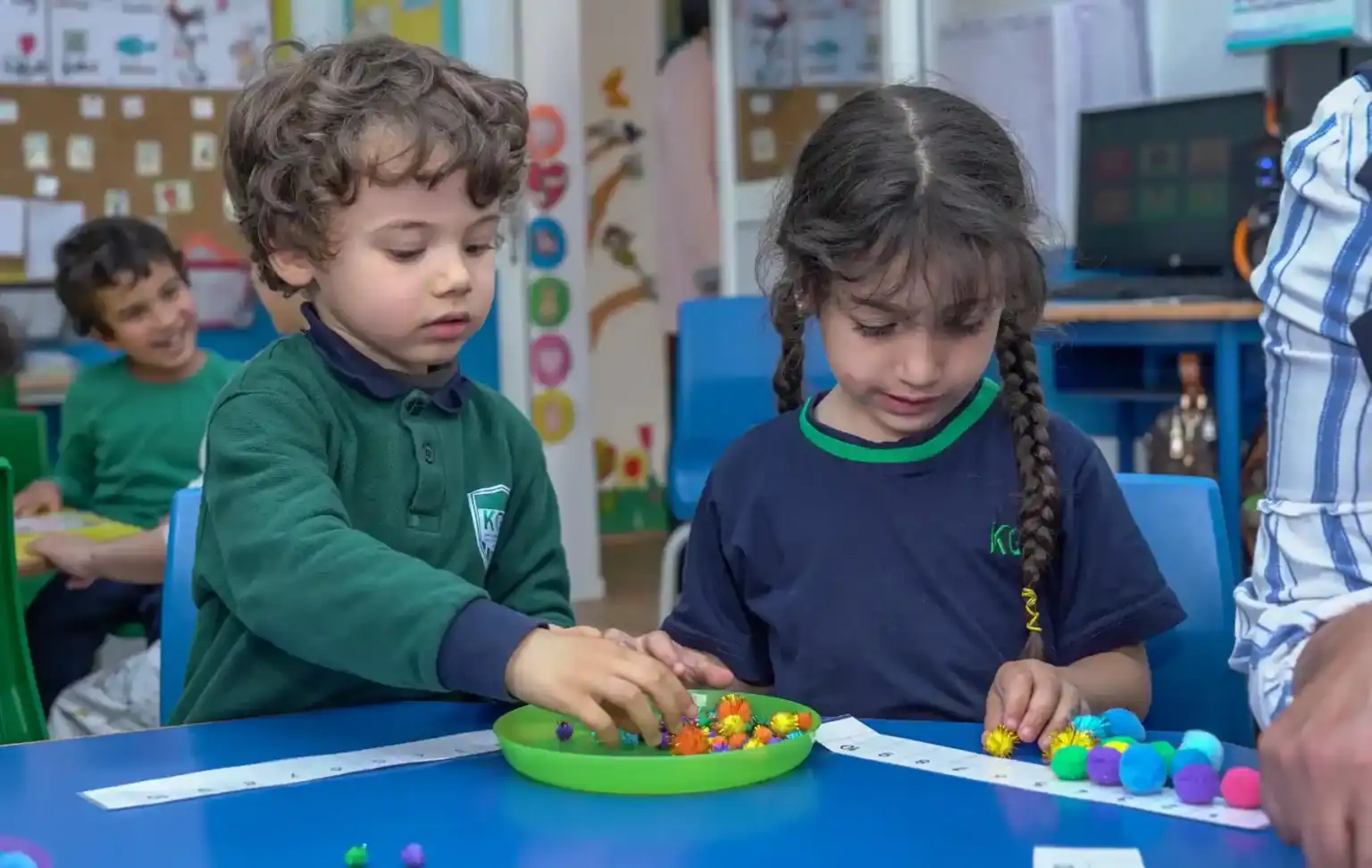 Colorful children engaging in educational activities at a world schools classroom.