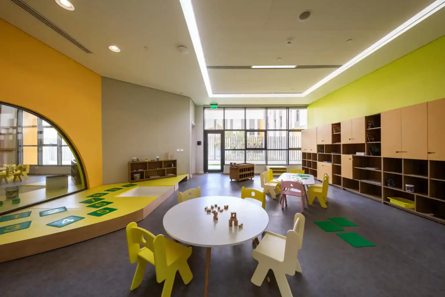 Bright modern classroom in a prestigious international school, designed for early childhood education and learning.