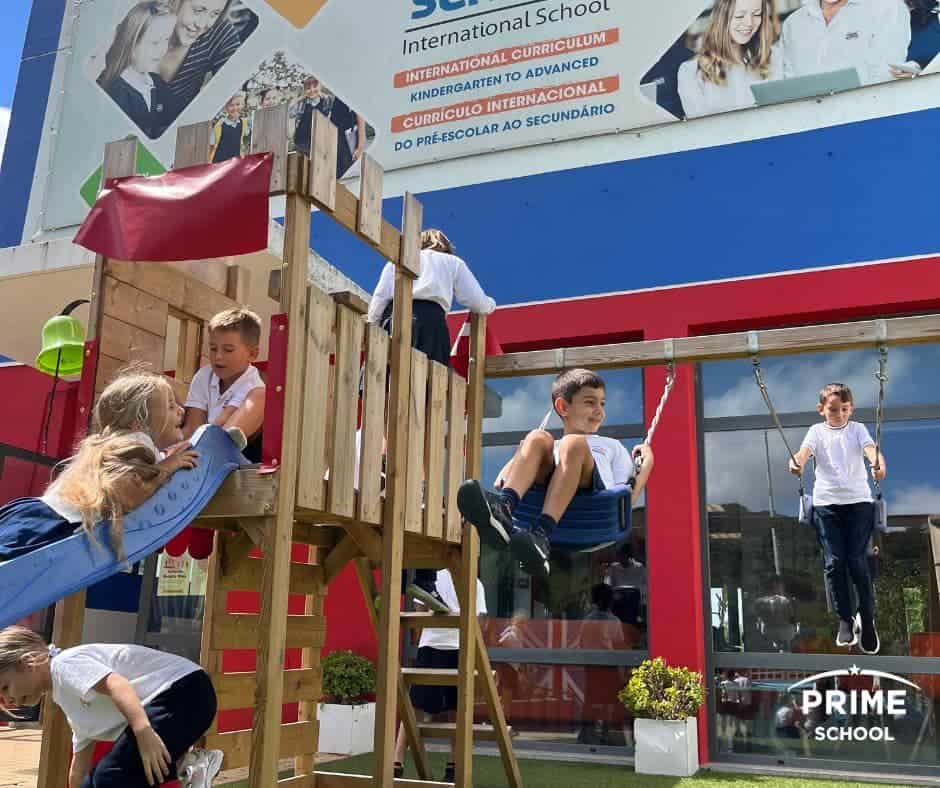 International school playground with students playing, emphasizing global education and extracurricular activities.