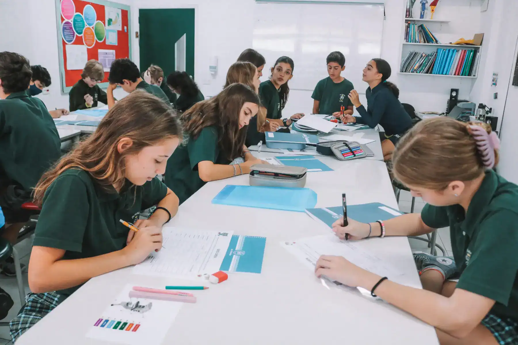 Focused students engaged in classroom activities at a world school for optimal learning.